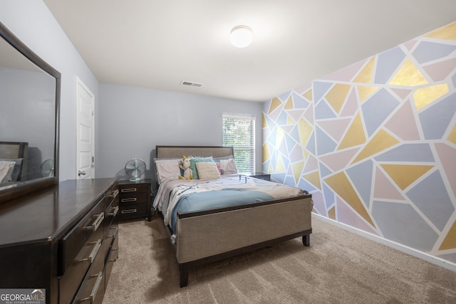 carpeted bedroom featuring visible vents