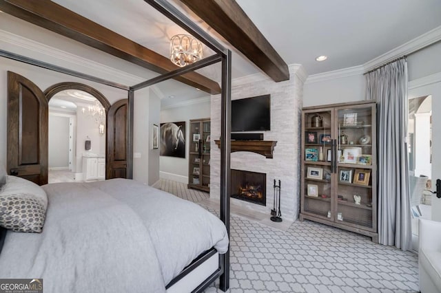 carpeted bedroom with crown molding, arched walkways, a notable chandelier, and beam ceiling