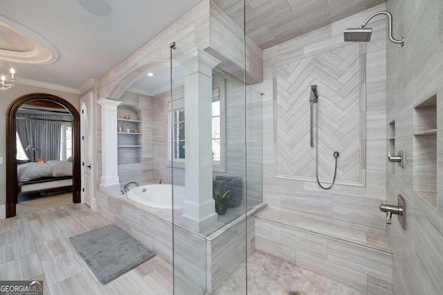full bathroom with a garden tub, decorative columns, connected bathroom, ornamental molding, and tiled shower