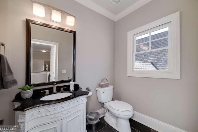 half bath with vanity, toilet, baseboards, visible vents, and ornamental molding