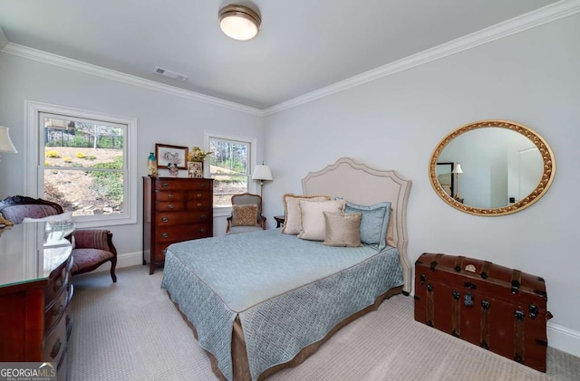 carpeted bedroom with baseboards, ornamental molding, and visible vents