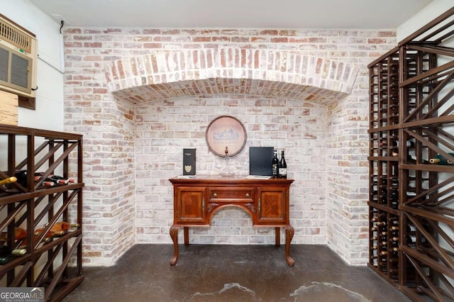 wine area with brick wall