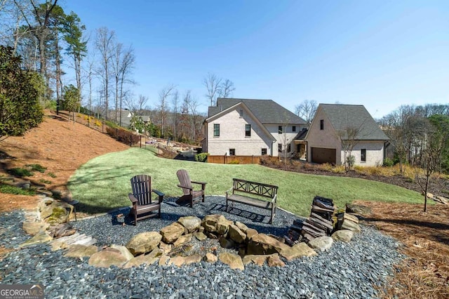 view of yard featuring a fire pit