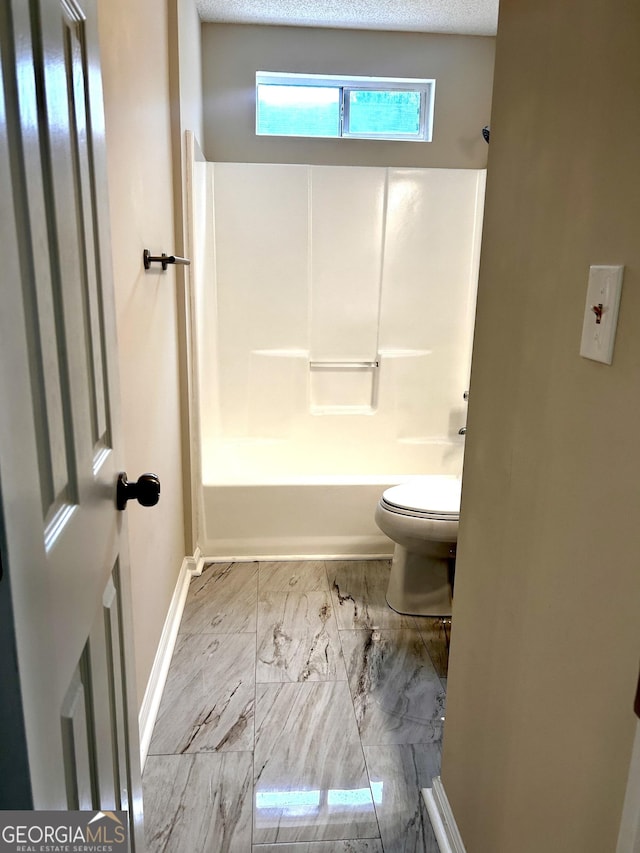 1864 Drew Cir, Austell, GA 30168 - bathroom featuring marble look tiles and shower / bath combination