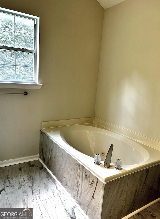 1864 Drew Cir, Austell, GA 30168 - full bathroom featuring a bath and marble look tile flooring