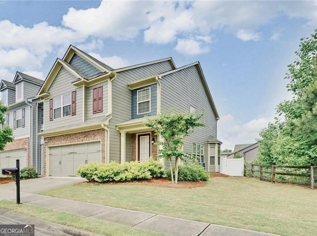 view of front facade with concrete driveway, fence, and a garage