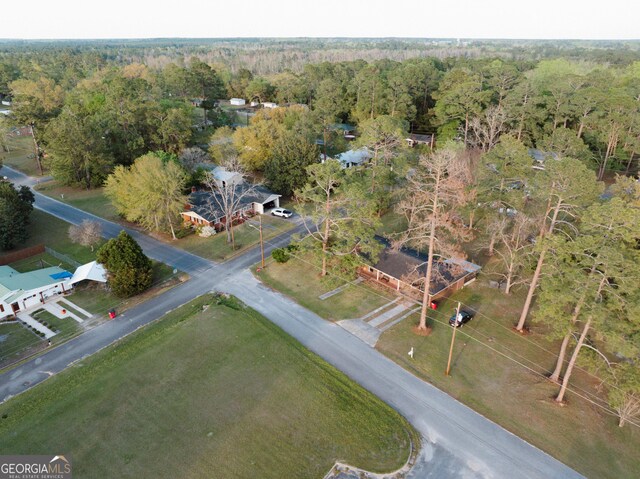 bird's eye view with a view of trees