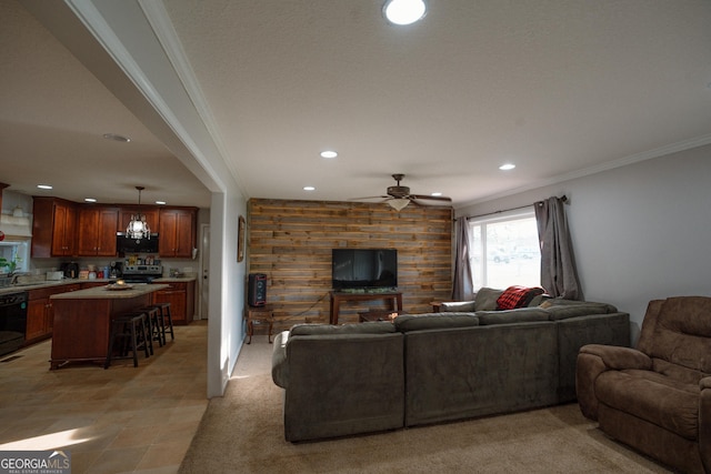 living room with crown molding, wood walls, ceiling fan, and recessed lighting