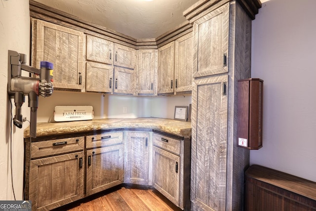 1329 Grandeur Dr, Blue Ridge, GA 30513 - kitchen featuring light wood finished floors and light stone counters