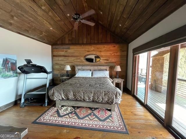 1329 Grandeur Dr, Blue Ridge, GA 30513 - bedroom featuring wooden ceiling, access to exterior, vaulted ceiling, and wooden walls