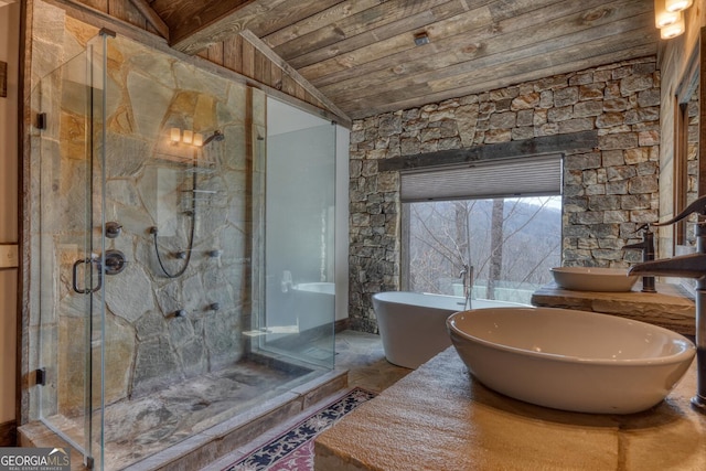 1329 Grandeur Dr, Blue Ridge, GA 30513 - bathroom featuring a marble finish shower, vaulted ceiling, and a soaking tub