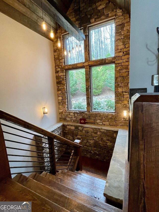 1329 Grandeur Dr, Blue Ridge, GA 30513 - stairway with a wealth of natural light and hardwood / wood-style floors