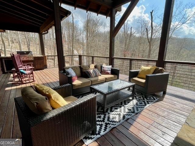 1329 Grandeur Dr, Blue Ridge, GA 30513 - deck featuring a grill and an outdoor living space