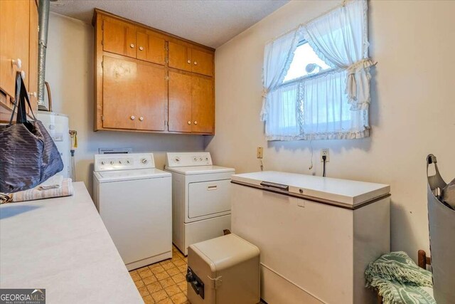 254 E Girard Ave, Cedartown, GA 30125 - laundry area with cabinet space, separate washer and dryer, water heater, and light floors