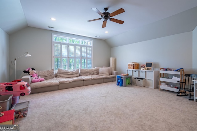 game room featuring lofted ceiling, a ceiling fan, carpet flooring, and visible vents