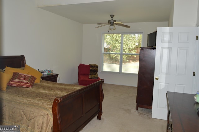 bedroom featuring light colored carpet