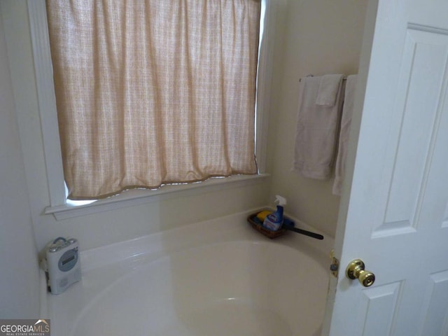 bathroom with a bath