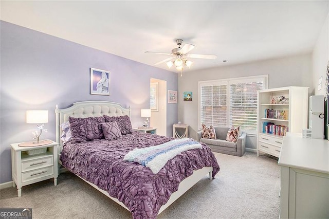 1190 Mosspointe Dr, Roswell, GA 30075 - carpeted bedroom with a ceiling fan
