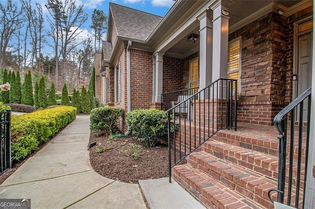 1190 Mosspointe Dr, Roswell, GA 30075 - property entrance with brick siding and roof with shingles