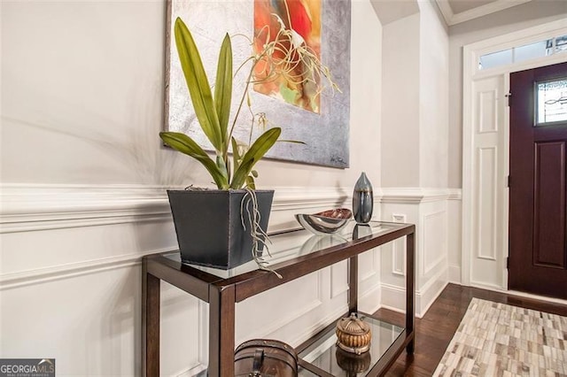 1190 Mosspointe Dr, Roswell, GA 30075 - entryway featuring a decorative wall, wainscoting, wood finished floors, and ornamental molding