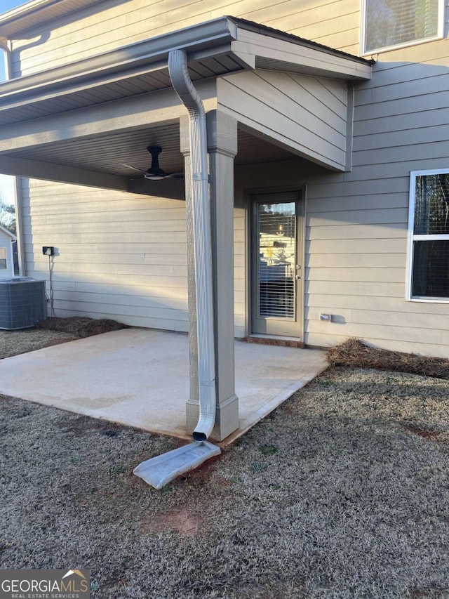736 Great Oak Pl Unit 10, Villa Rica, GA 30180 - view of exterior entry with a patio and central air condition unit