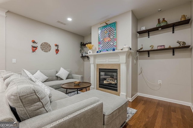 2705 Maple Park Pl Unit 29, Cumming, GA 30041 - living room featuring a tiled fireplace, wood finished floors, baseboards, visible vents, and recessed lighting
