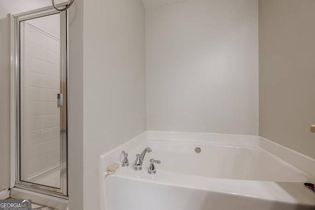 2705 Maple Park Pl Unit 29, Cumming, GA 30041 - bathroom with a shower stall and a garden tub