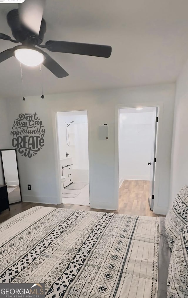 bedroom with baseboards, light wood-style flooring, and ceiling fan
