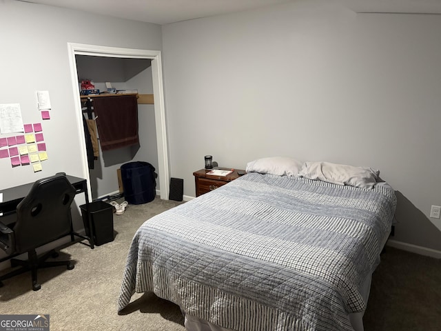 bedroom with light carpet and baseboards