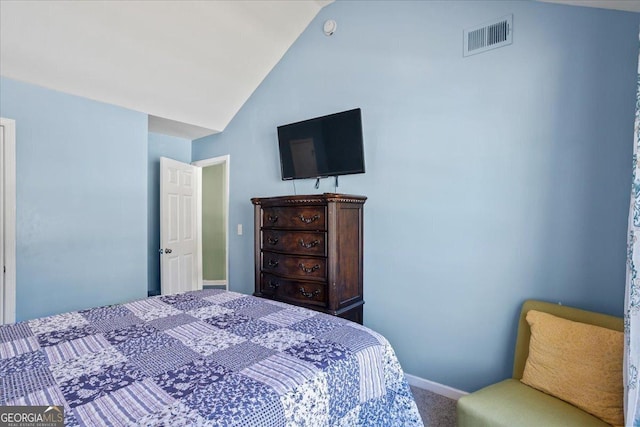 bedroom featuring carpet, visible vents, lofted ceiling, and baseboards