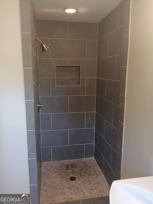 full bathroom with a stall shower