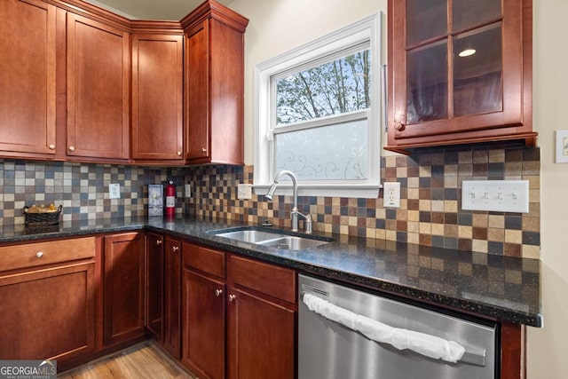 2694 Dawning Day Dr, Dacula, GA 30019 - kitchen with a sink, tasteful backsplash, stainless steel dishwasher, and dark stone countertops