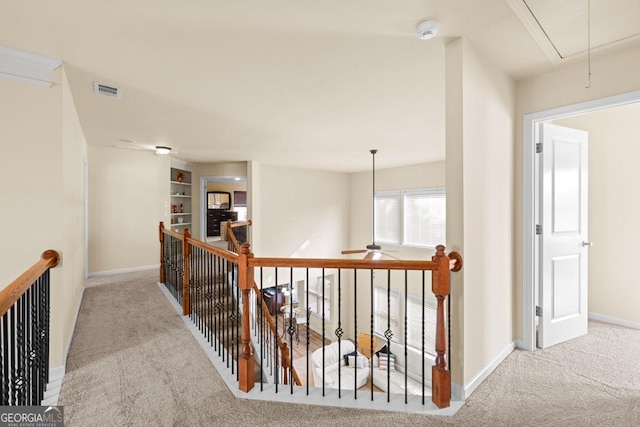 2694 Dawning Day Dr, Dacula, GA 30019 - hallway with carpet floors, visible vents, baseboards, attic access, and an upstairs landing