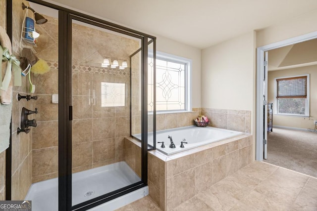 2694 Dawning Day Dr, Dacula, GA 30019 - bathroom featuring a shower stall and a bath