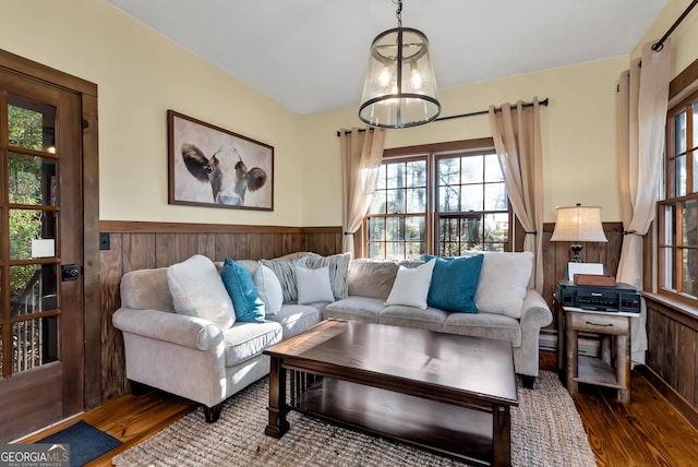 80 Lake Forest Ct, Lakemont, GA 30552 - living area with wood finished floors, a wainscoted wall, healthy amount of natural light, and wood walls