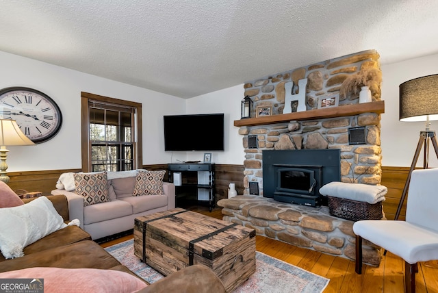 80 Lake Forest Ct, Lakemont, GA 30552 - living room featuring wood finished floors, a wainscoted wall, and a textured ceiling