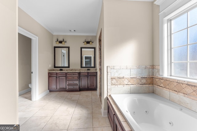 157 Wessex Dr, Bonaire, GA 31005 - bathroom with healthy amount of natural light, a whirlpool tub, double vanity, crown molding, and tile patterned floors