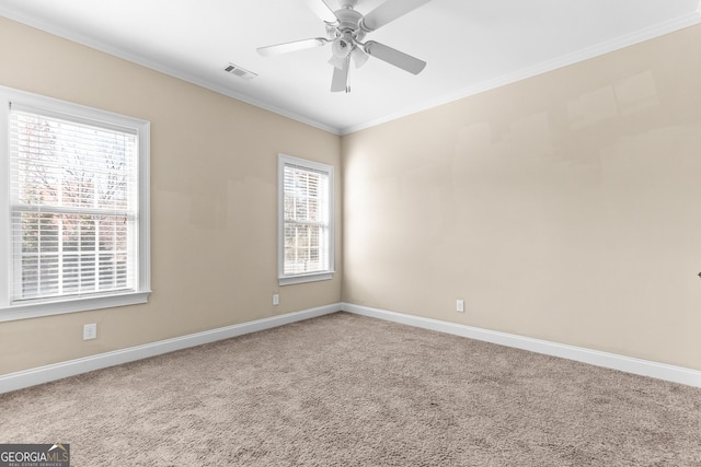 157 Wessex Dr, Bonaire, GA 31005 - unfurnished room with ornamental molding, carpet floors, and a ceiling fan