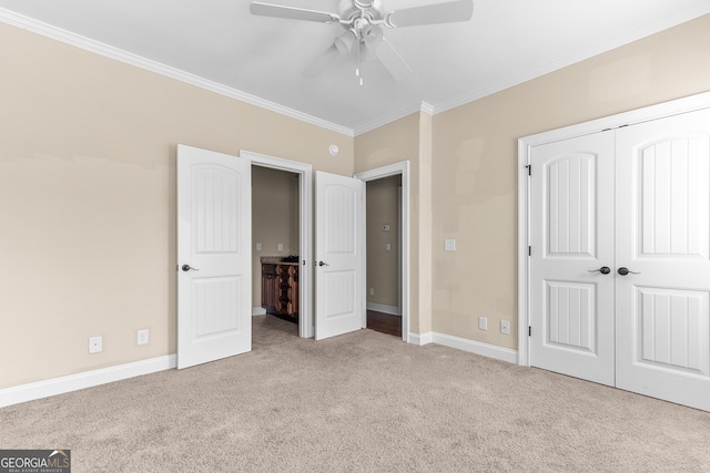 157 Wessex Dr, Bonaire, GA 31005 - unfurnished bedroom with carpet floors, crown molding, a closet, and a ceiling fan