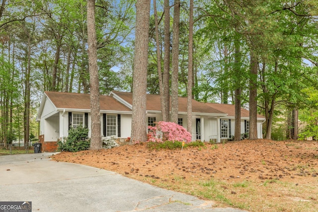 2694 Hickory Valley Dr, Snellville, GA 30078 - ranch-style home featuring board and batten siding and driveway