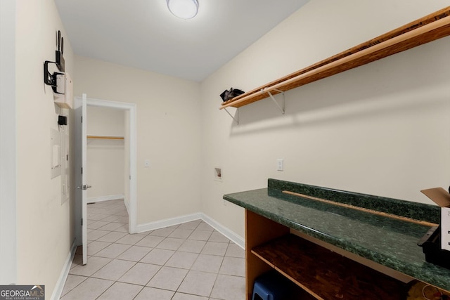 spacious closet with light tile patterned flooring