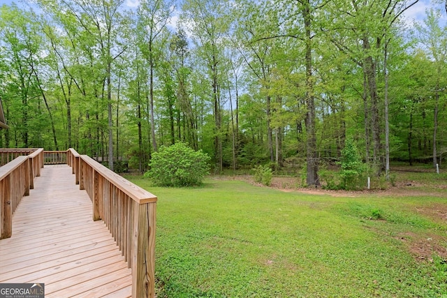 view of yard featuring a view of trees