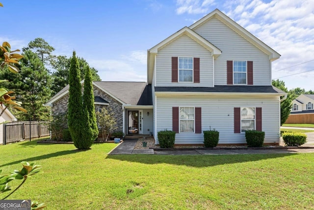 726 Fir Chase, Fairburn, GA 30213 - traditional-style house with a front lawn and fence