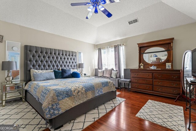 726 Fir Chase, Fairburn, GA 30213 - bedroom featuring vaulted ceiling, a ceiling fan, wood finished floors, a textured ceiling, and visible vents
