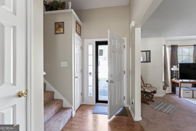 726 Fir Chase, Fairburn, GA 30213 - foyer entrance with baseboards, wood finished floors, and stairway