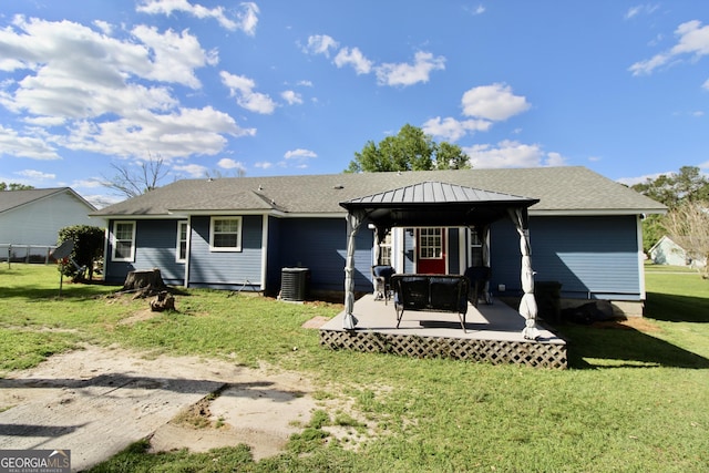 3789 Heatherwoods Dr, Valdosta, GA 31605 - rear view of property with a gazebo, a deck, a lawn, and central air condition unit