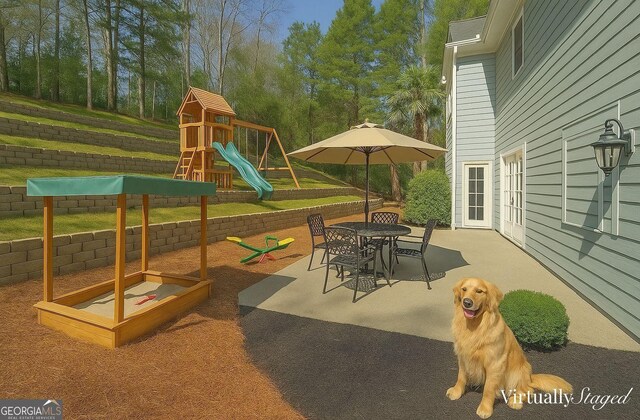 pool featuring a pergola and a patio