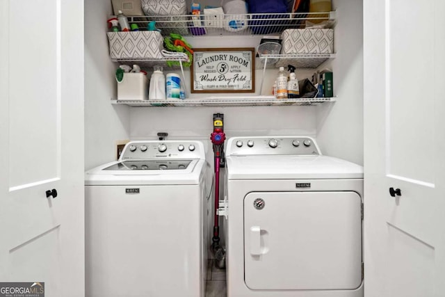 6695 Woodstock Rd, Acworth, GA 30102 - washroom featuring washing machine and clothes dryer and laundry area