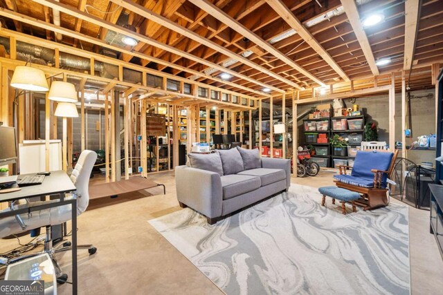 6695 Woodstock Rd, Acworth, GA 30102 - living room featuring concrete floors