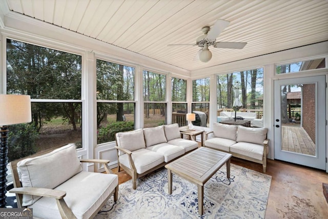 6695 Woodstock Rd, Acworth, GA 30102 - sunroom with an outdoor living space and a ceiling fan